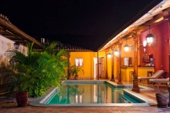Colonial home in Granada, pool view, at night – Best Places In The World To Retire – International Living